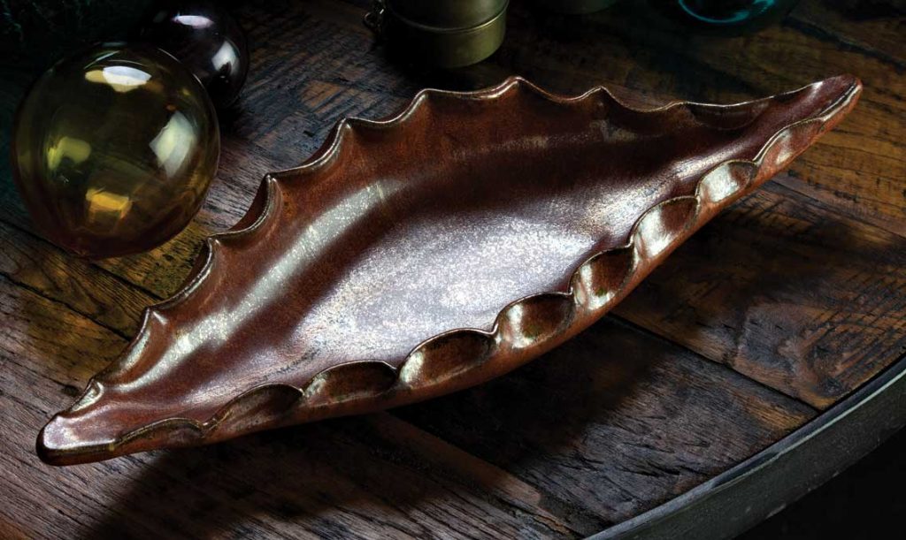 Phoenix Home & Garden Masters of the Southwest award-winning ceramist Jim Sudal’s timeless agave leaf dish is now available in a limited-edition, dazzling copper finish. 12"L by 5"W, $125; 17"L by 7"W, $175; 24"L by 9:W. $225 (jimsudalceramicdesign.com)