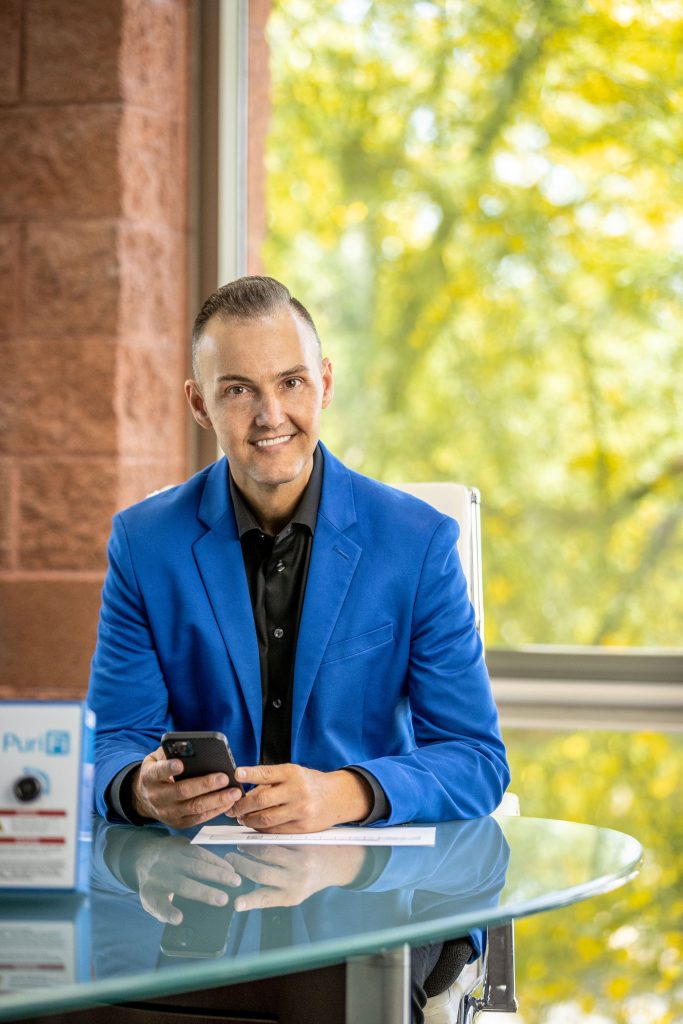Portrait of a man in a blue suit