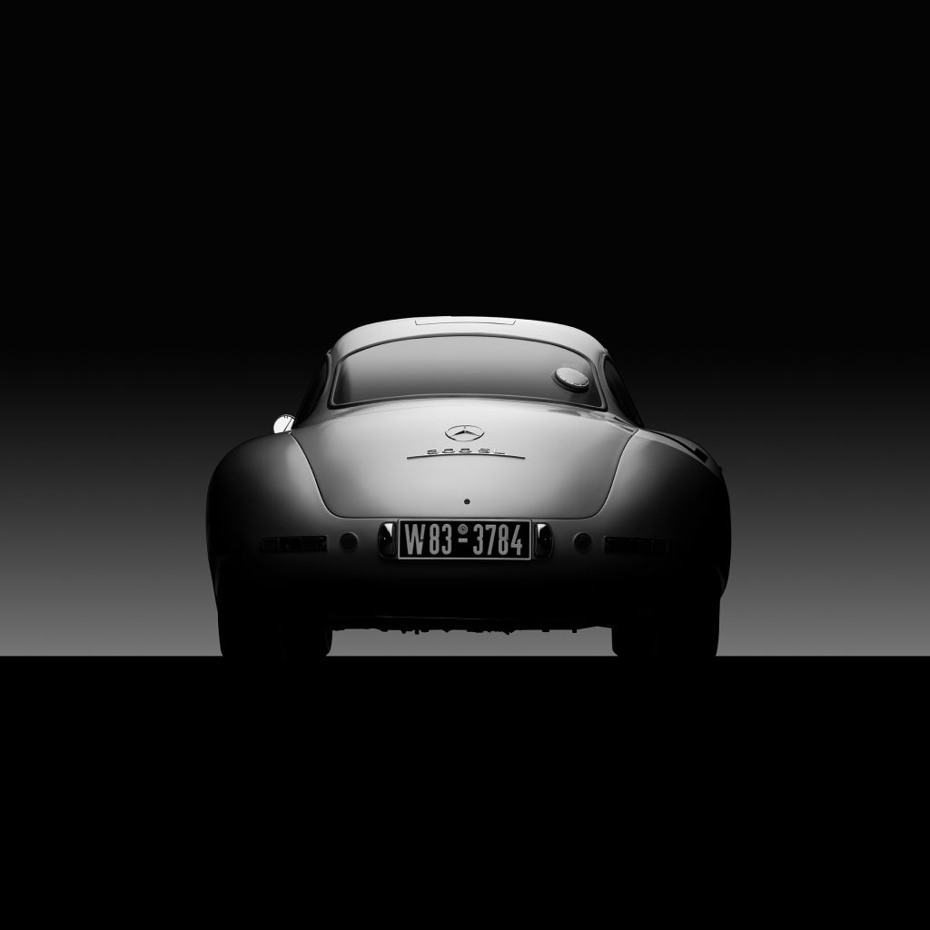 Dramatic photo of the back of a Mercedes