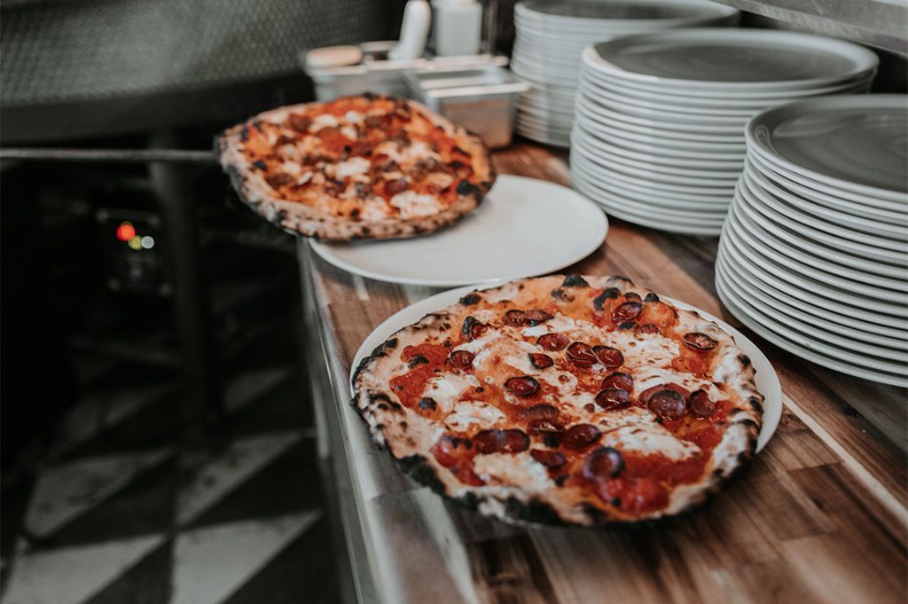 Woodfired pizza on a table
