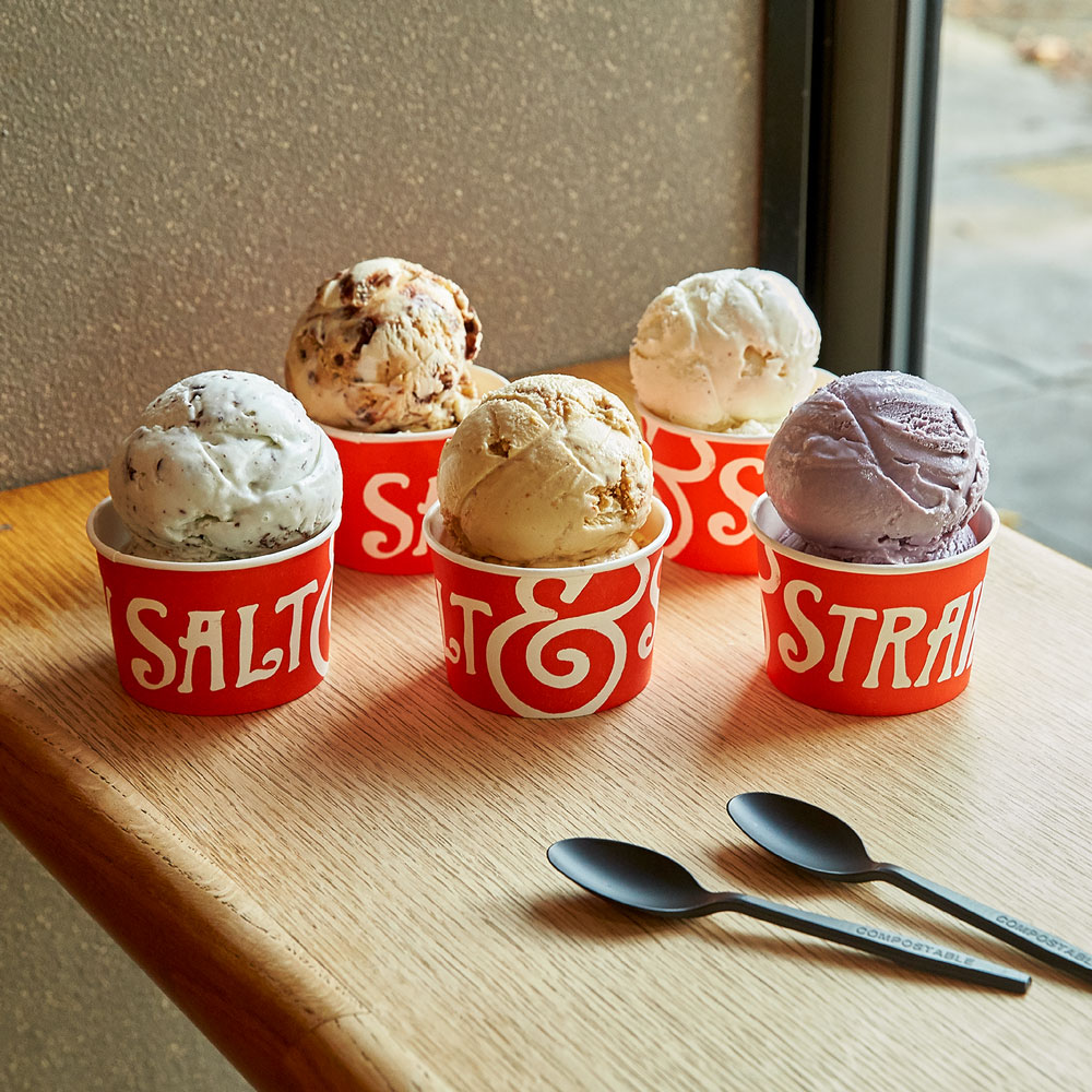 Cups of ice cream in red containers