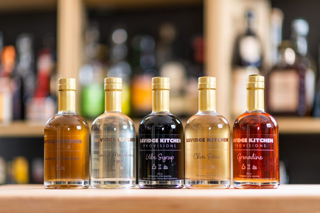 Bottled syrups in different colors