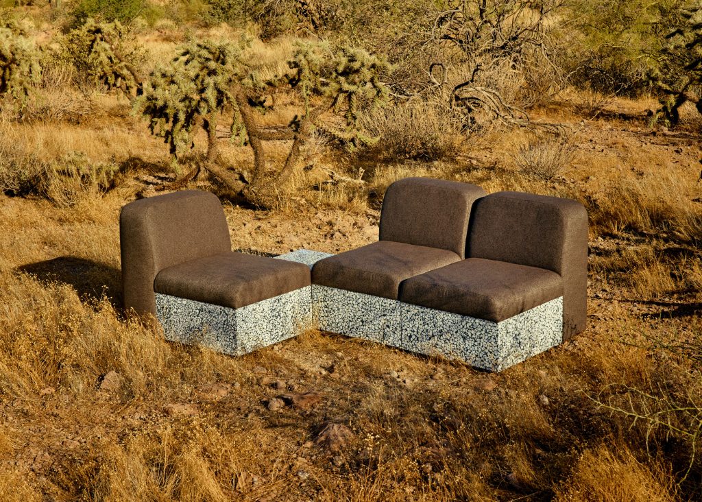 A sofa and chair in the desert