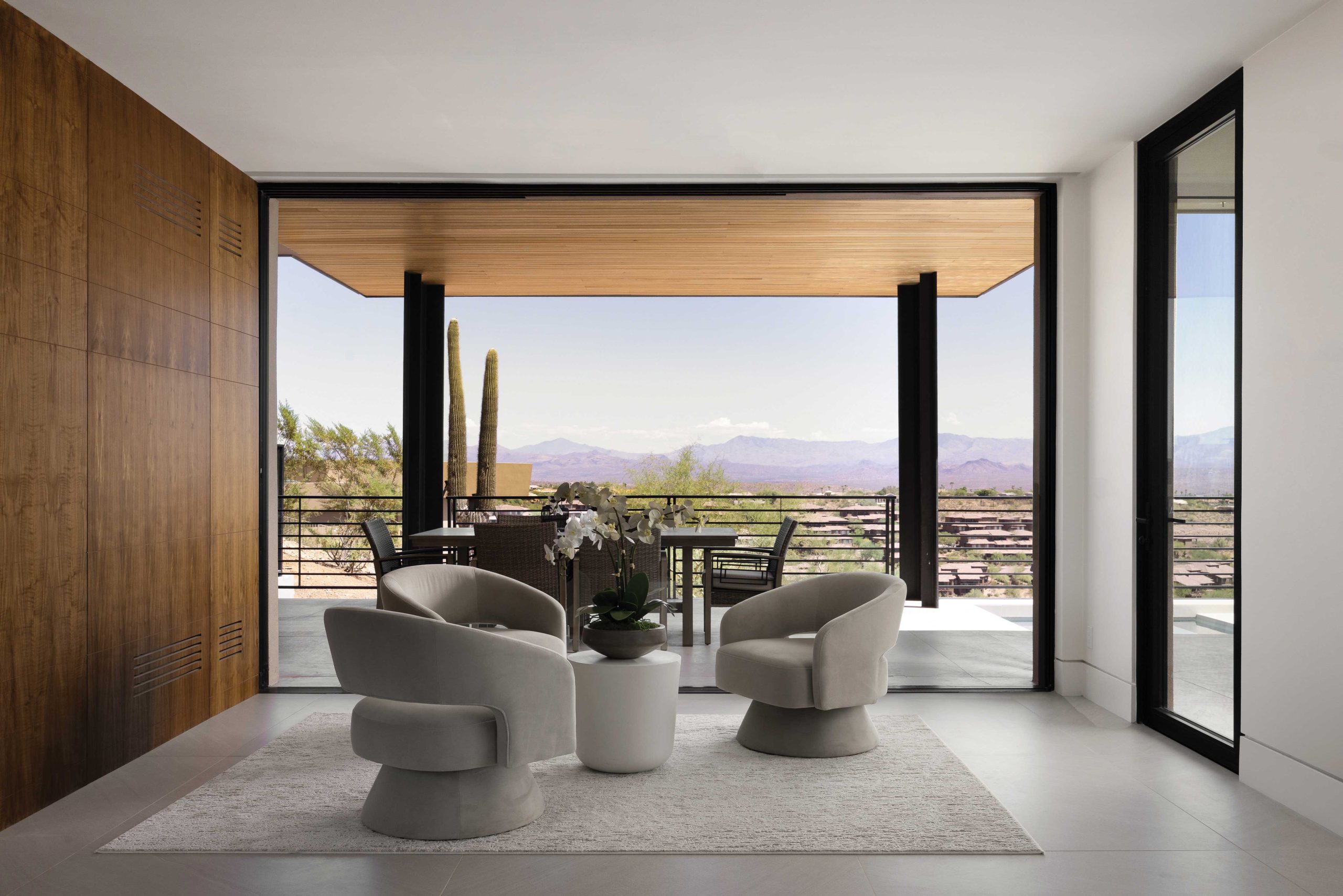 The breakfast nook’s floor-to-ceiling doors open to the morning air. “I like cantilevers and very thin overhangs in my architecture,” Tsontakis says. “They’re very important here in the desert for shade and protection.”