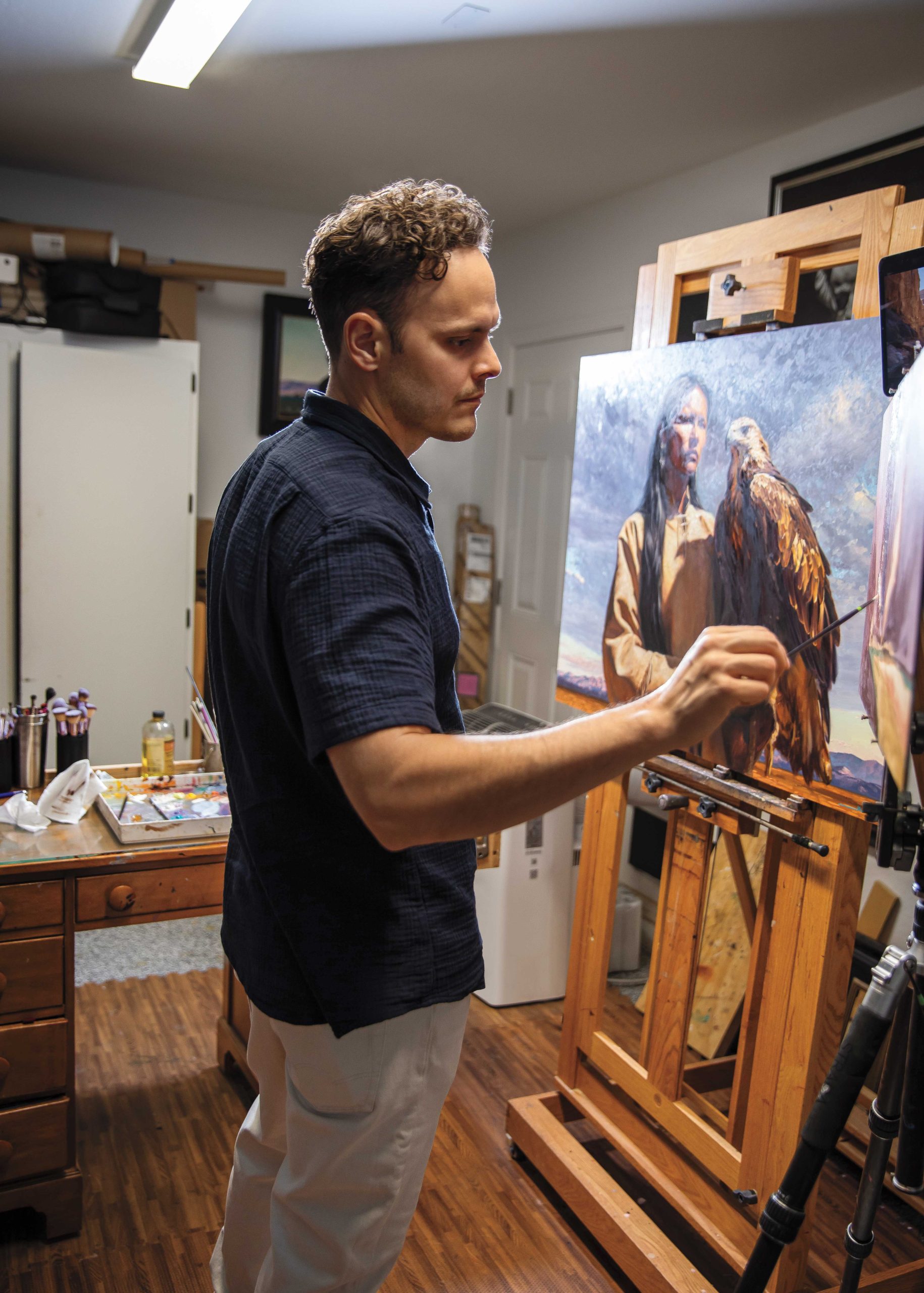 Working in his Scottsdale studio, Noon builds paintings from multiple reference images, refining composition and light digitally before translating the final image into paint.