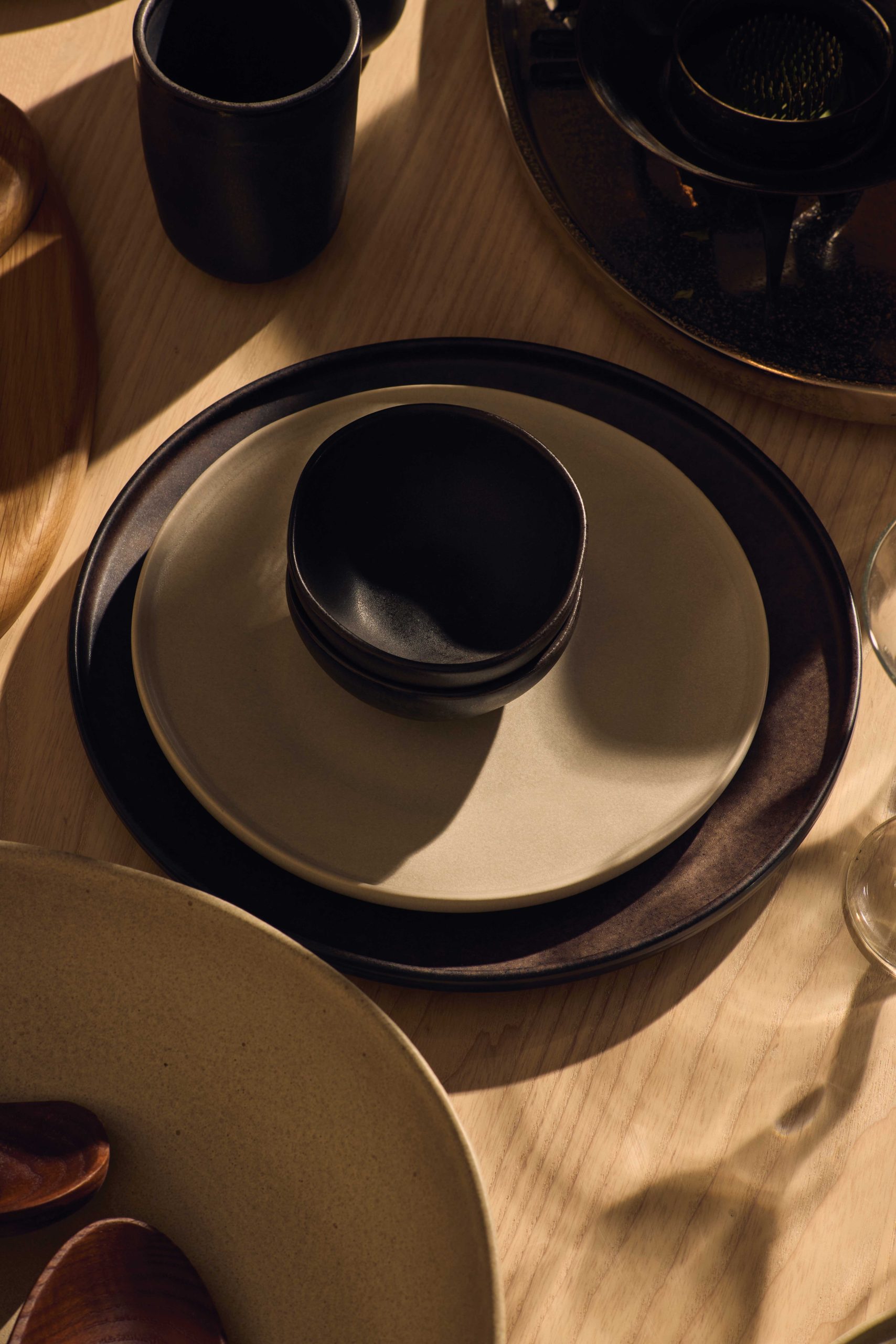 This vignette of ceramic dishware by MUUBS shows pieces from both the Arcadia and Denali collections, which can be intermixed.