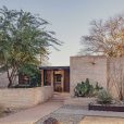 Architect Joanna Noonan and builder Dan Noonan used a minimal approach to update the 1970s home. To keep the entry’s garden walls, they matched new block to the original mortar-washed walls.